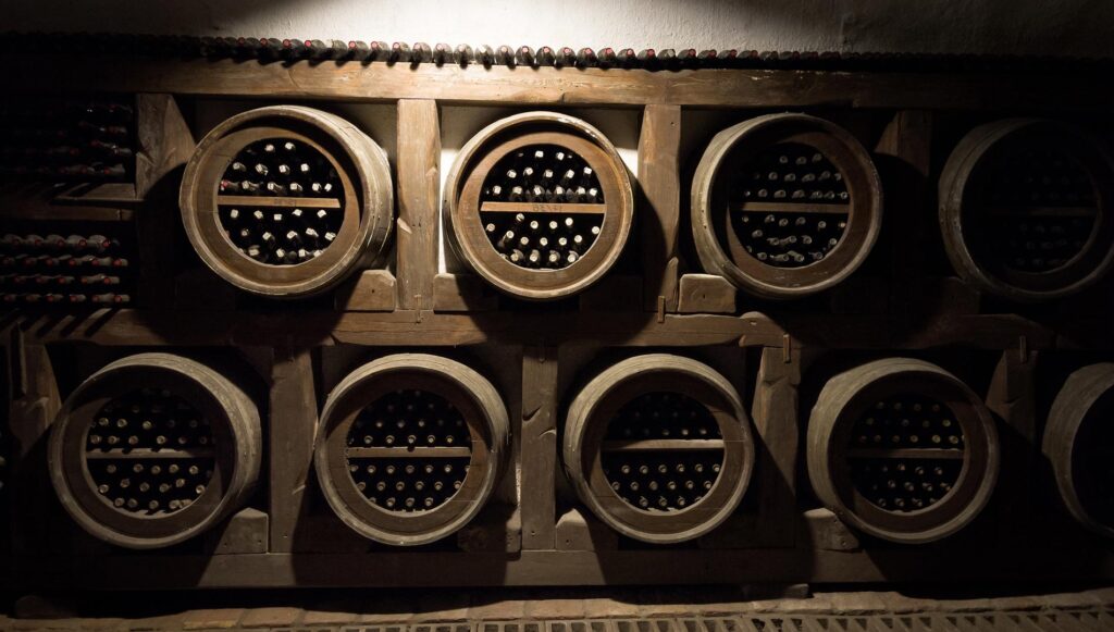 Image of wine barrels adding to the article about Wine Investment Trends