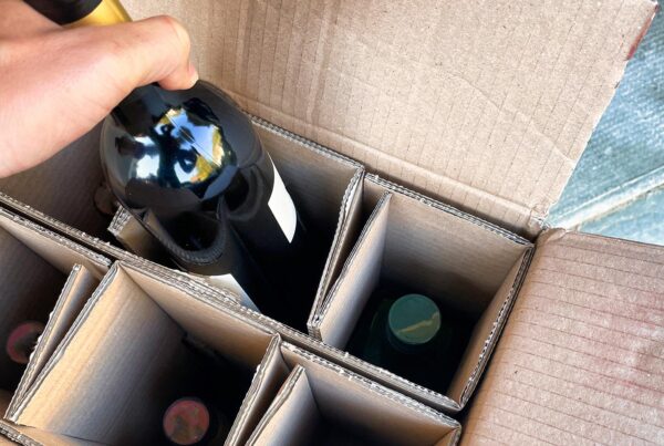 Image of wine in box after been delivered from an online wine store.